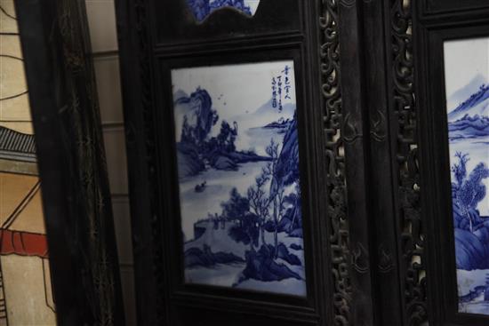 A set of four Chinese blue and white porcelain mounted wood panels, 121.5 x 38cm